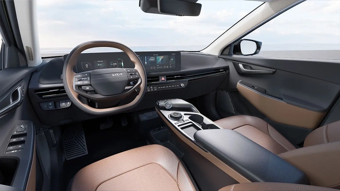 Habitacle raffiné du Kia EV6 2025, illustrant l’ergonomie, les finitions haut de gamme et les technologies embarquées de ce VUS électrique.